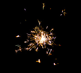 Image showing Single bright festive New Year Christmas sparkler