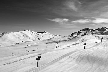 Image showing Ski slope with snowmaking at sun day