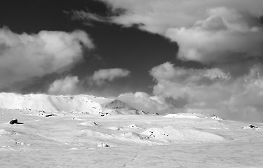 Image showing Ice-covered slope and snowy mountains in fog