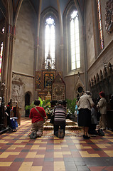 Image showing On Good Friday, people pray in front of God's tomb in the Zagreb Cathedral