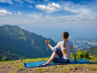 Image showing Woman doing Hatha yoga asana outdoors