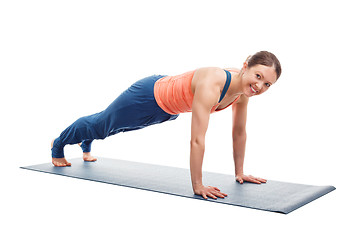 Image showing Woman doing yoga asana Utthita chaturanga dandasana (or phalakasana)