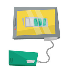 Image showing Charging digital tablet from solar battery.