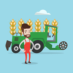 Image showing Farmer standing with combine on background.