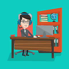 Image showing Businessman with headset working at office.