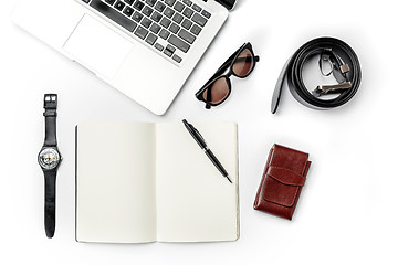 Image showing Still life of casual man. Modern male accessories and laptop on white