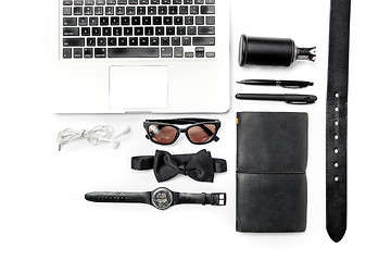 Image showing Still life of casual man. Modern male accessories and laptop on white