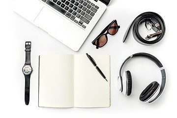 Image showing Still life of casual man. Modern male accessories and laptop on white