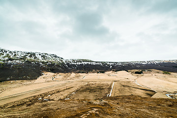 Image showing Fields and mountains in cloudy weather