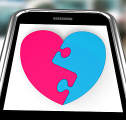 Image showing Two-Pieced Heart On Smartphone Showing Complement