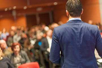 Image showing Public speaker giving talk at Business Event.