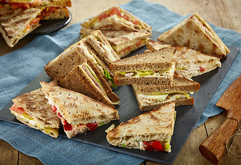 Image showing various triangle sandwiches 