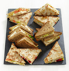 Image showing various triangle sandwiches 