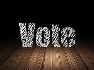 Image showing Political concept: Vote in grunge dark room