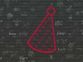 Image showing Holiday concept: Party Hat on wall background