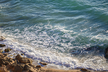 Image showing Scenic view of sea waves washing big rocks