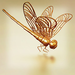 Image showing Gold dragonfly on a metall background. 3D illustration. Vintage 
