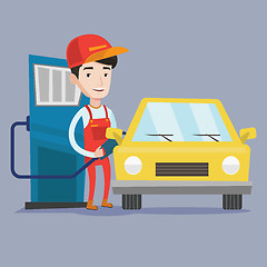 Image showing Worker filling up fuel into car.