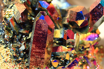 Image showing crystal with metal rainbow surface