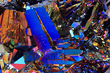 Image showing crystal with metal rainbow surface