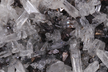 Image showing white rock-crystal with galenite background