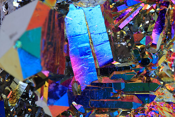 Image showing crystal with metal rainbow surface