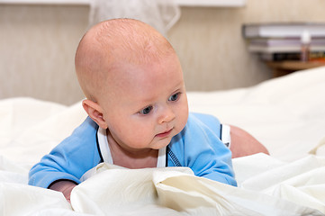 Image showing Baby explores the world