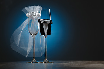 Image showing Two wineglass with special decoration for wedding party isolated