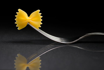 Image showing Pasta farfalle on a fork