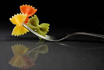 Image showing Pasta farfalle on a fork