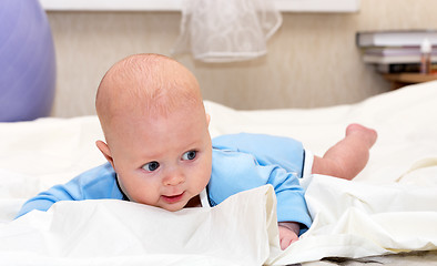 Image showing Baby explores the world