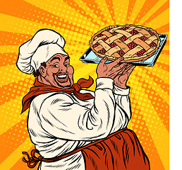 Image showing African American or Latino cook with a berry pie