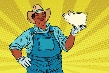 Image showing African American farmer with a pig-piggy Bank