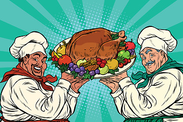 Image showing multi-ethnic chefs with roast Turkey