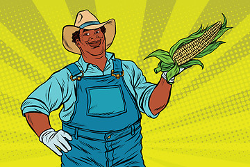 Image showing African American farmer with corn on the cob