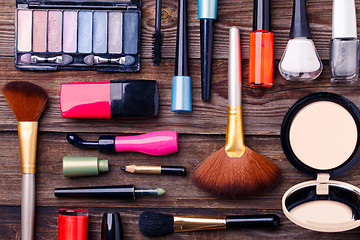 Image showing Cosmetics set on wooden background