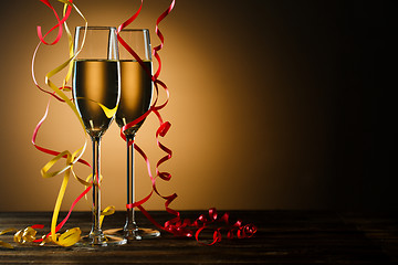 Image showing Two glasses with champagne on festive table