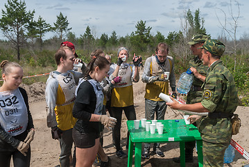 Image showing Athletes drink water on route.Tyumen