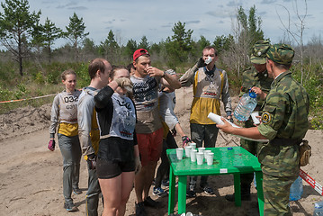 Image showing Athletes drink water on route.Tyumen