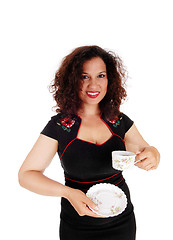 Image showing Woman holding coffee cup.