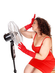 Image showing Hot woman with big fan.