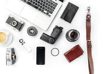 Image showing Workplace of business. Modern male accessories and laptop on white