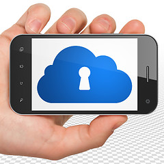 Image showing Cloud networking concept: Hand Holding Smartphone with Cloud With Keyhole on display