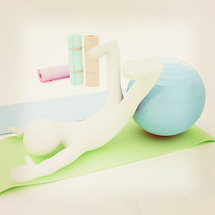 Image showing 3d man on a karemat with fitness ball. 3D illustration. 3D illus