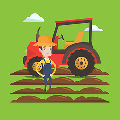 Image showing Farmer standing with tractor on background.
