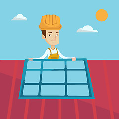 Image showing Constructor installing solar panel.