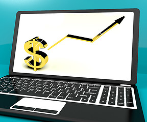 Image showing Dollar Sign And Up Arrow On Computer For Earnings Or Profit