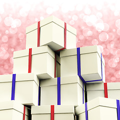 Image showing Stack Of Giftboxes With Bokeh Background As Presents For The Fam