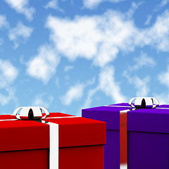 Image showing Red And Blue Gift Boxes With Sky Background As Presents For Him 