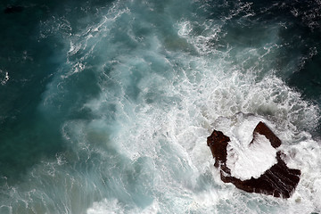 Image showing looking down onto a single rock